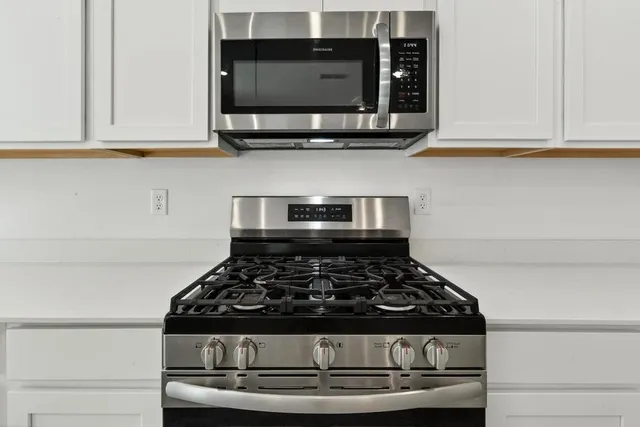 an empty room with a bathroom