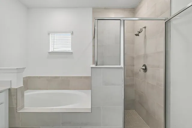a view of a balcony with a floor to ceiling window and wooden floor