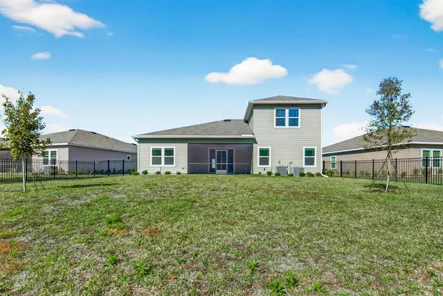 a view of a bench in a backyard