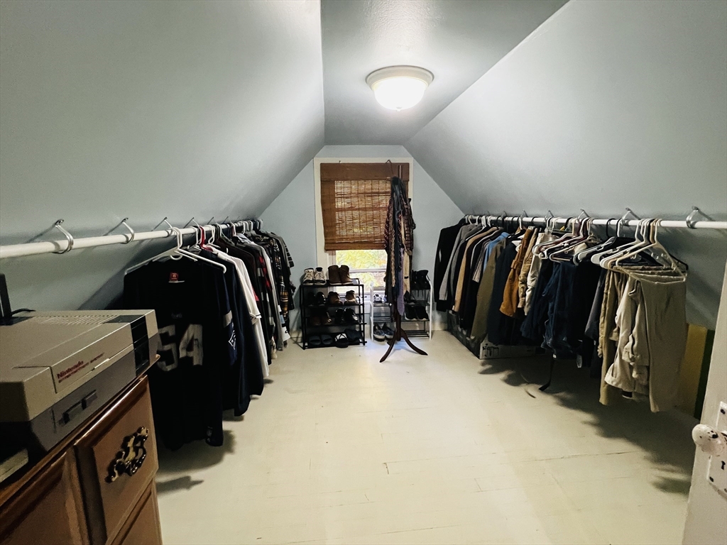 4 Hastings Road Spencer, MA 01562 - Photo 14 of 16 a view of walk in closet with clothes and shoes