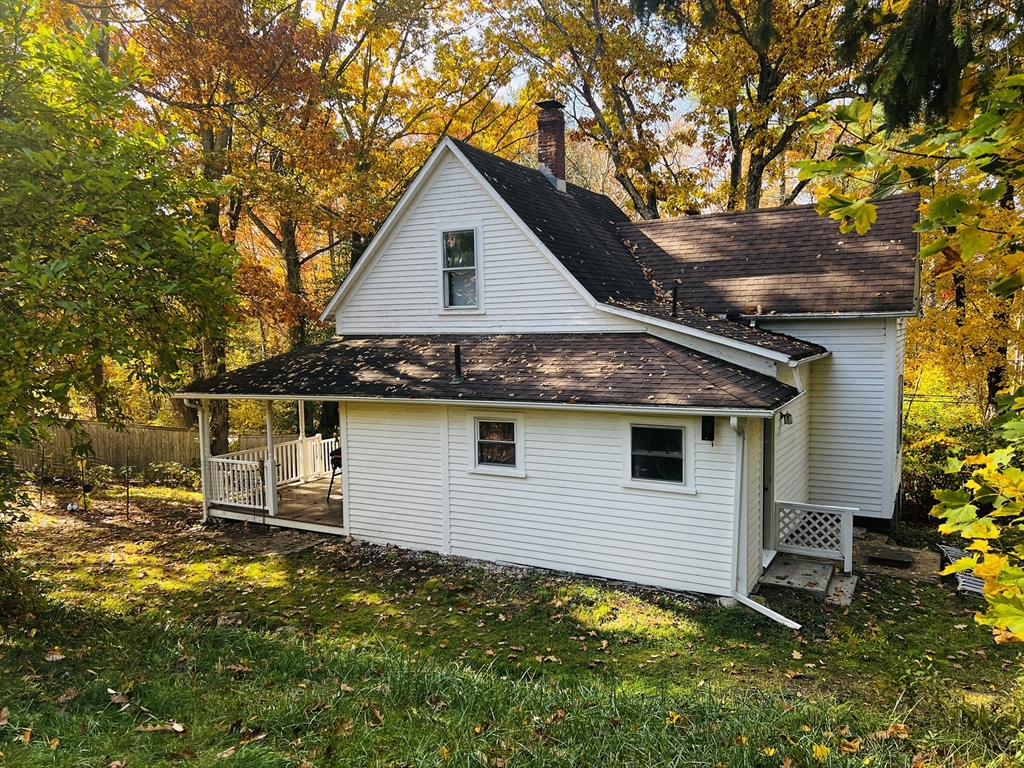 4 Hastings Road Spencer, MA 01562 - Photo 4 of 16 a view of house with backyard
