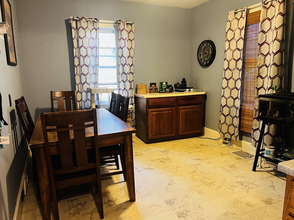 4 Hastings Road Spencer, MA 01562 - Photo 7 of 16 a room with a desk and chair