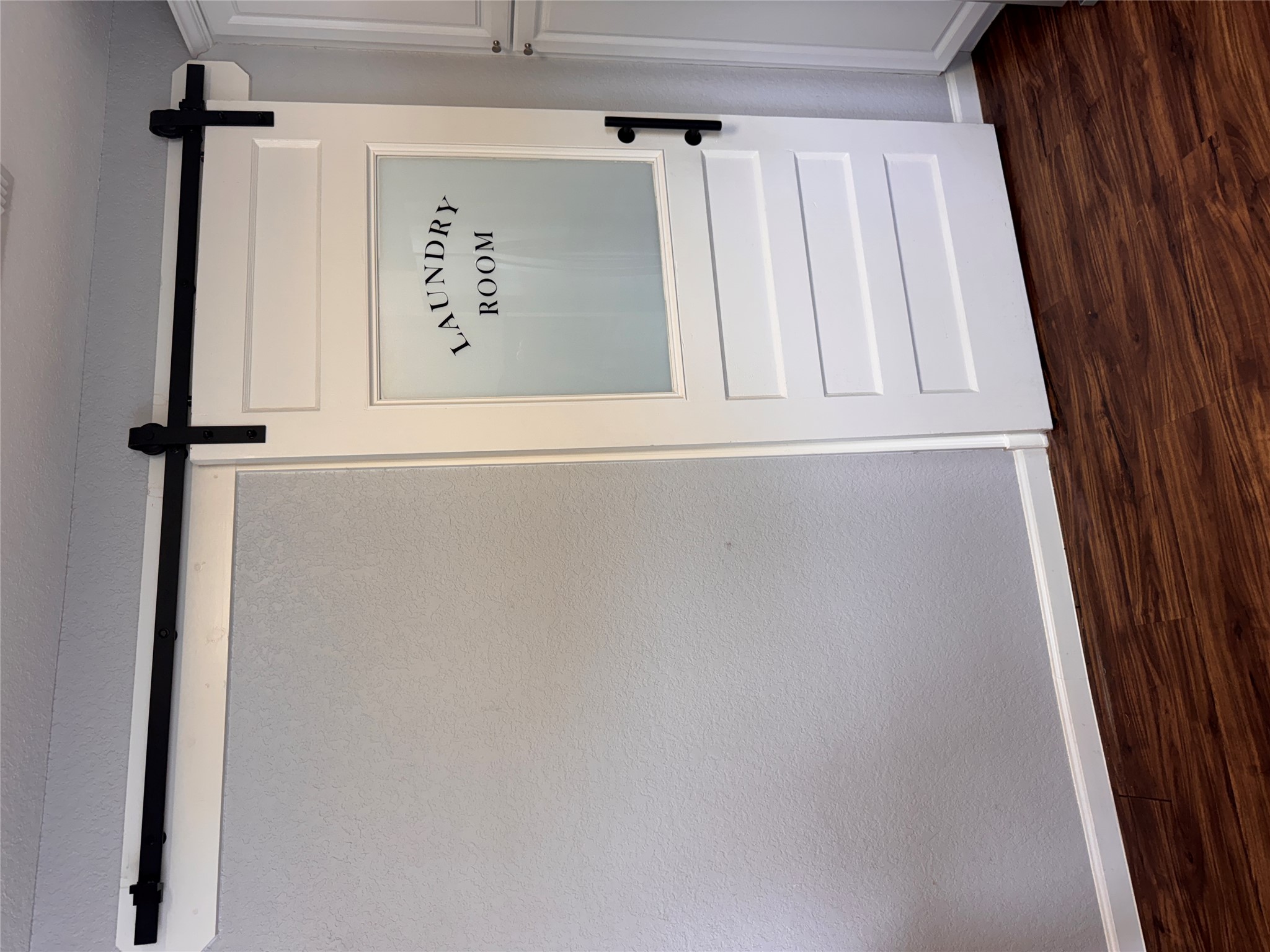 217 Walnut Avenue Luling, TX 78648 - Photo 21 of 38 a view of a room with wooden floor