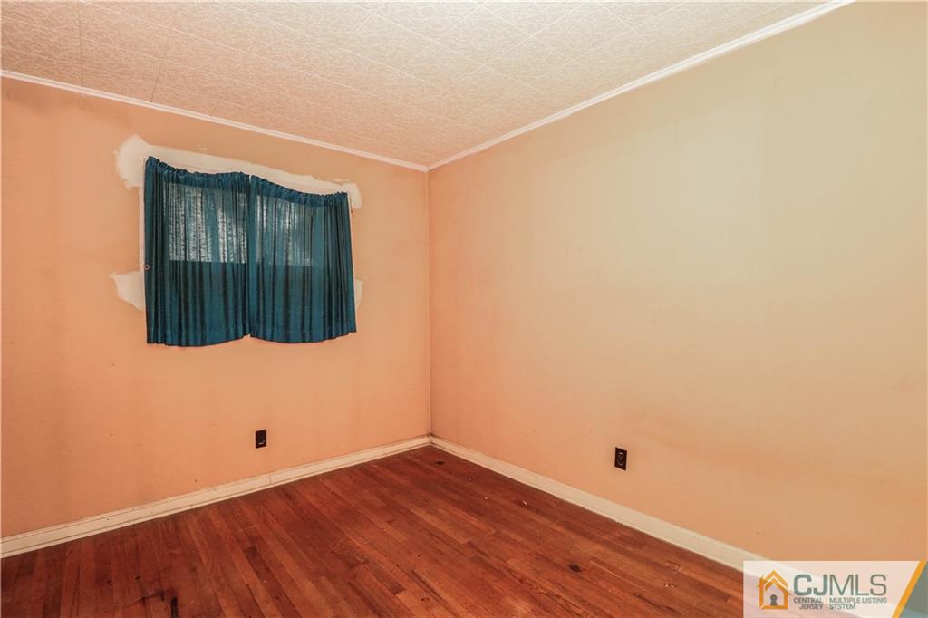 8 Kelly Street Metuchen, NJ 08840 - Photo 17 of 25 a view of an empty room