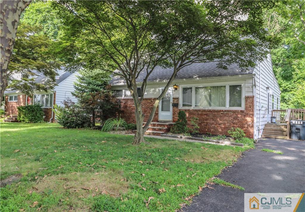 8 Kelly Street Metuchen, NJ 08840 - Photo 3 of 25 a front view of a house with a yard