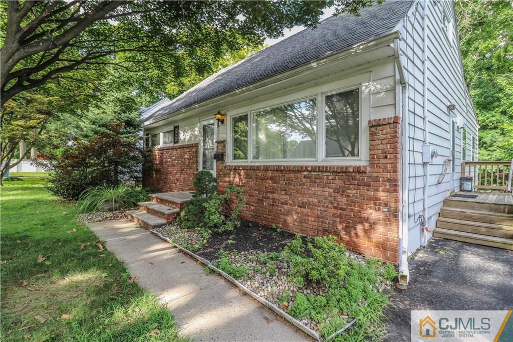 8 Kelly Street Metuchen, NJ 08840 - Photo 4 of 25 a view of a house with a yard