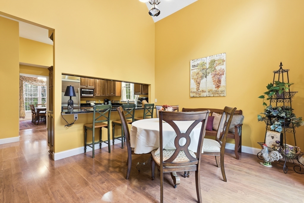 113 Greenwich Plains Road Ware, MA 01082 - Photo 7 of 42 a dining room with furniture and wooden floor