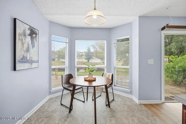 a workspace with furniture and a window