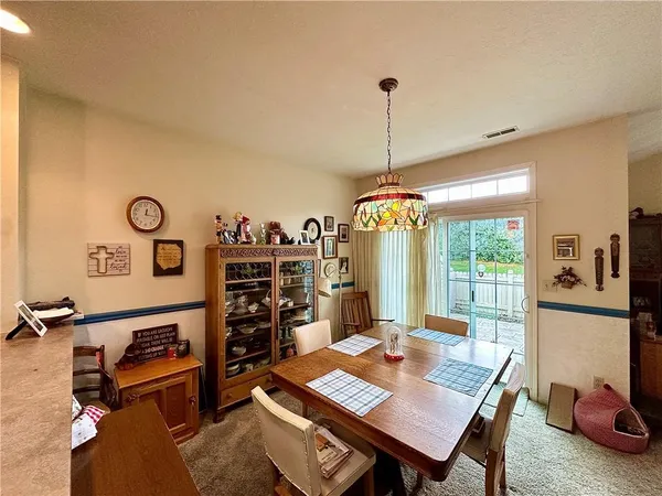 a view of a workspace with furniture