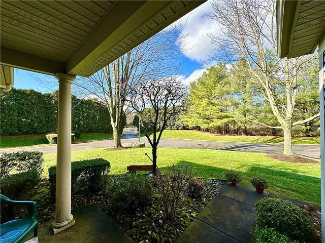 a view of yard with swimming pool