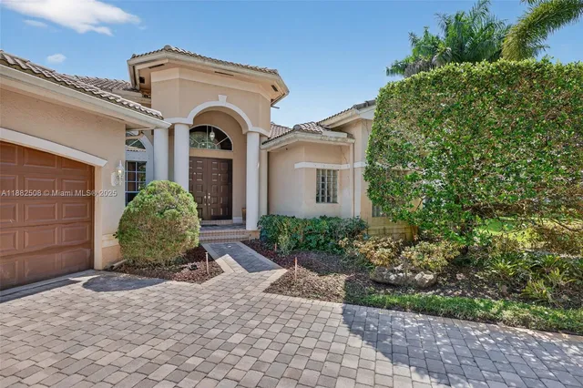 a view of a livingroom with furniture and a large window