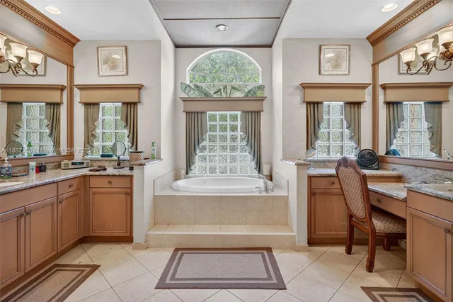 a view of a patio with a table chairs and a backyard