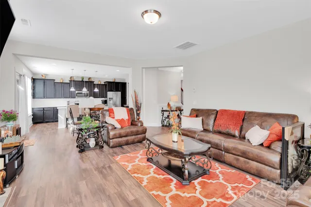a living room with furniture and a couch