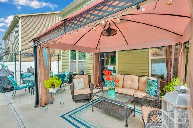 a outdoor living space with furniture and garden