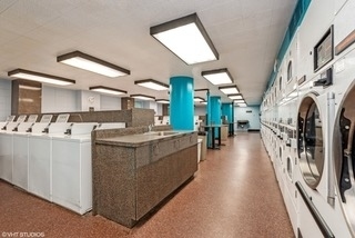 5415 North Sheridan Road, Unit 4805 Chicago, IL 60640 - Photo 28 of 30 a large white kitchen with lots of counter top space