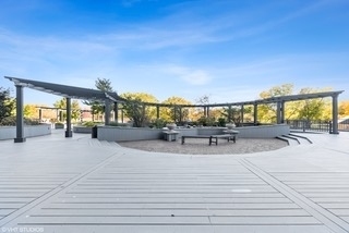 5415 North Sheridan Road, Unit 4805 Chicago, IL 60640 - Photo 29 of 30 a view of a swimming pool with outdoor seating