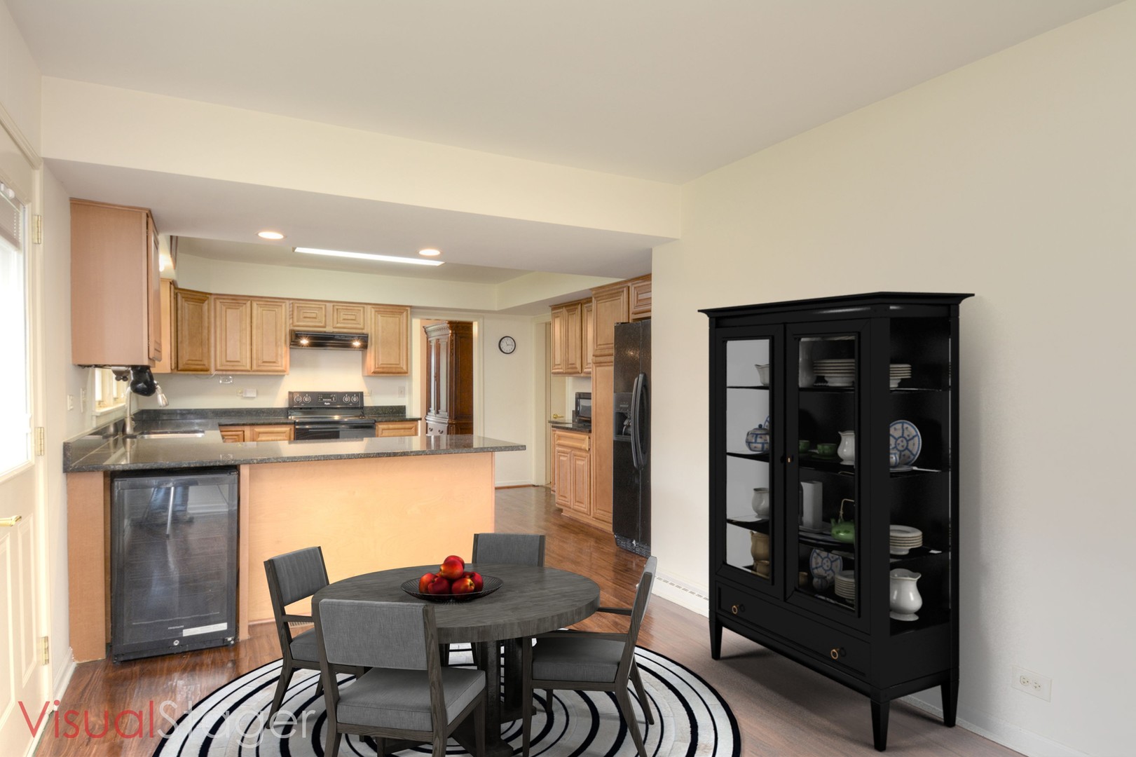 455 Lombard Road Itasca, IL 60143 - Photo 10 of 35 a kitchen with stainless steel appliances granite countertop a dining table chairs and a refrigerator
