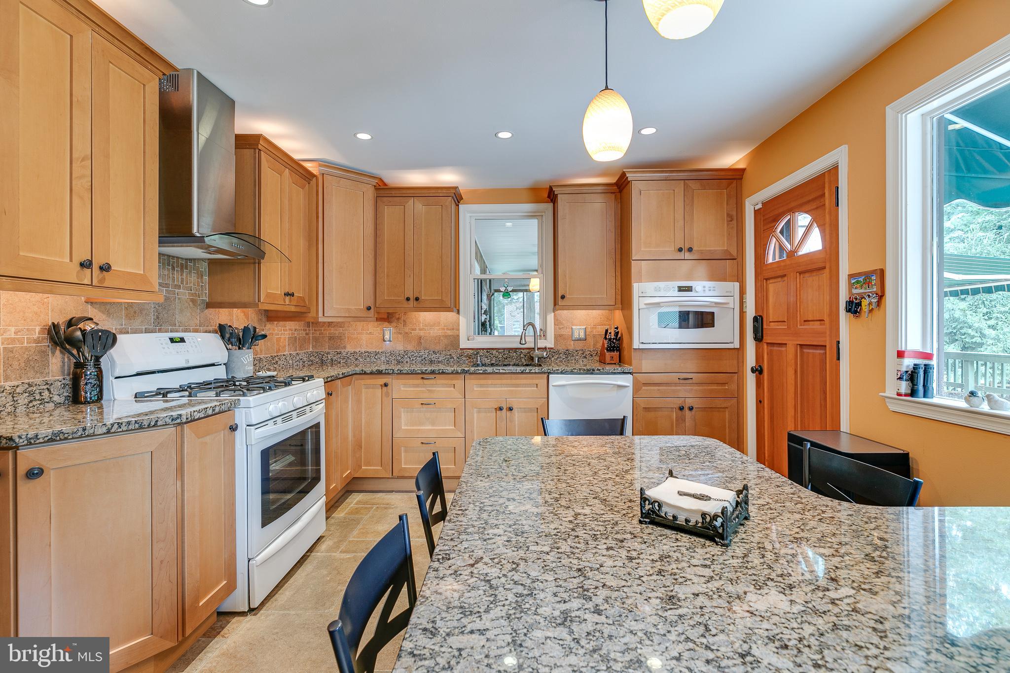 3366 Pine Road Huntingdon Valley, PA 19006 - Photo 15 of 48 Slate counters, counter seating with chairs
