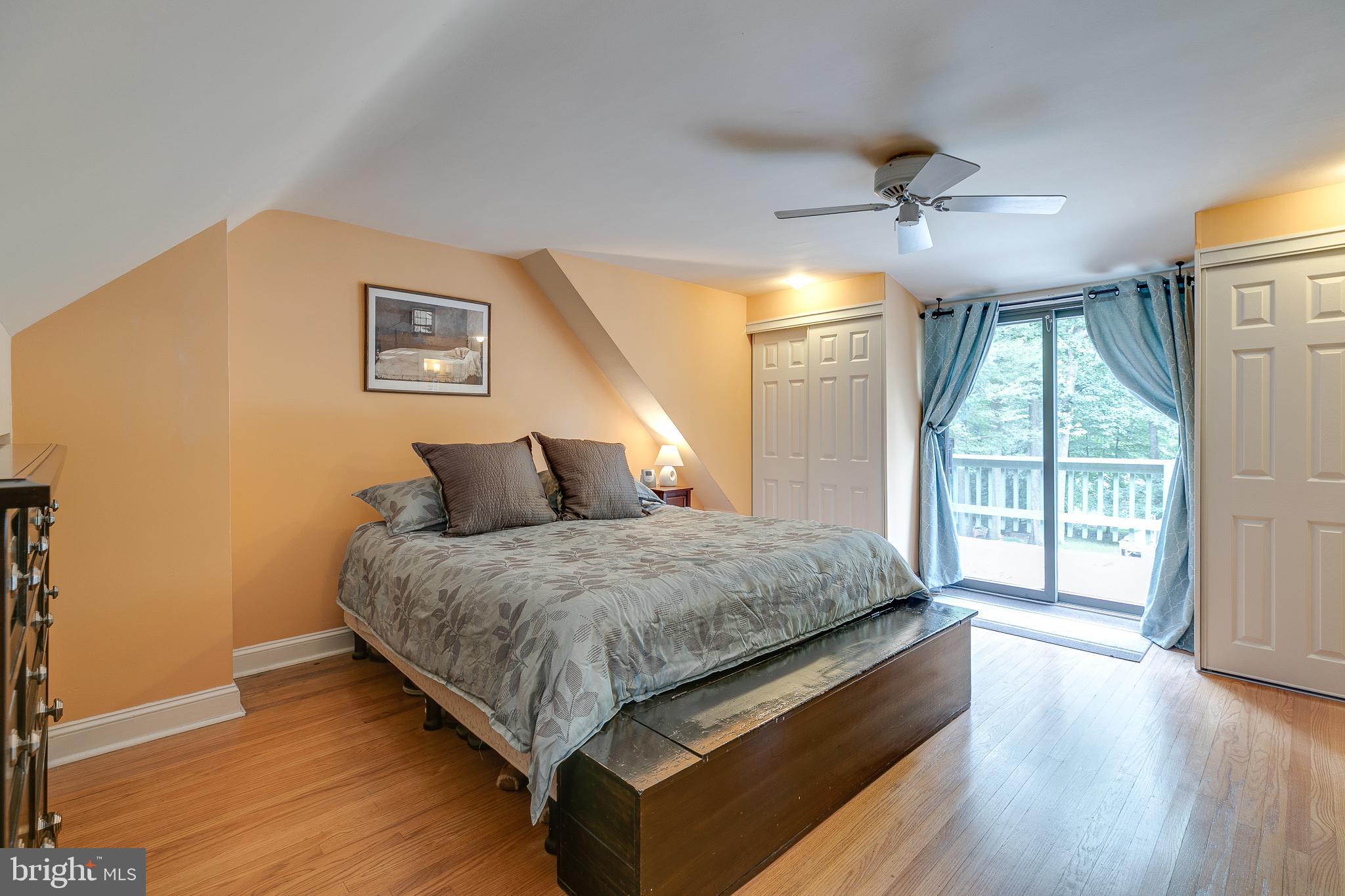 3366 Pine Road Huntingdon Valley, PA 19006 - Photo 24 of 48 Master bedroom with sliders to elevated deck area