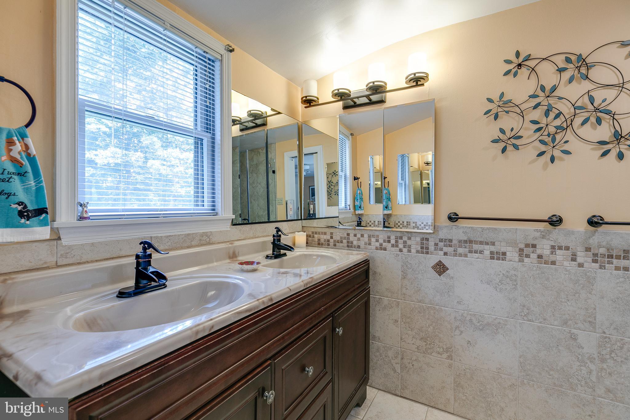 3366 Pine Road Huntingdon Valley, PA 19006 - Photo 26 of 48 Elegant master bath with pocket door, double sinks