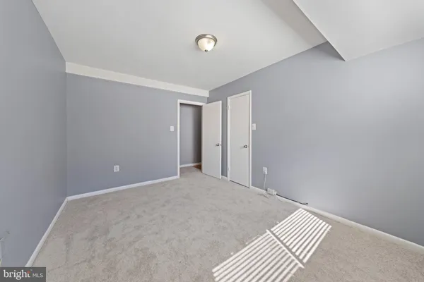 a view of a room with an empty space