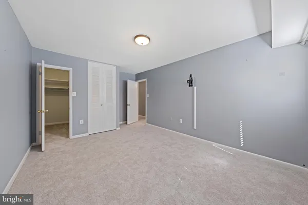 a view of a livingroom with closet area