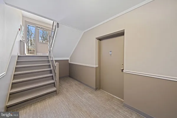 a view of an entryway with staircase