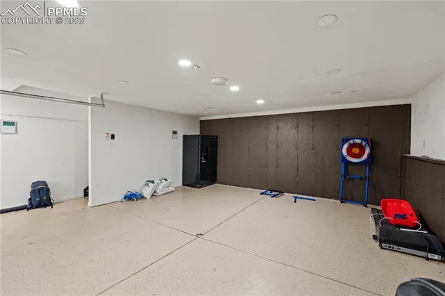 a bedroom with a bed and a table