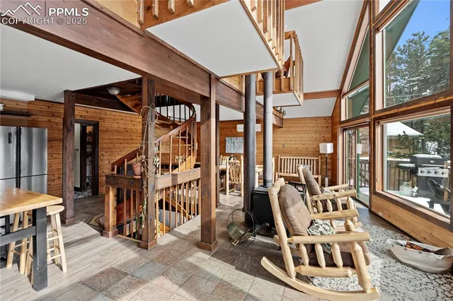 a view of a chairs and table in a patio