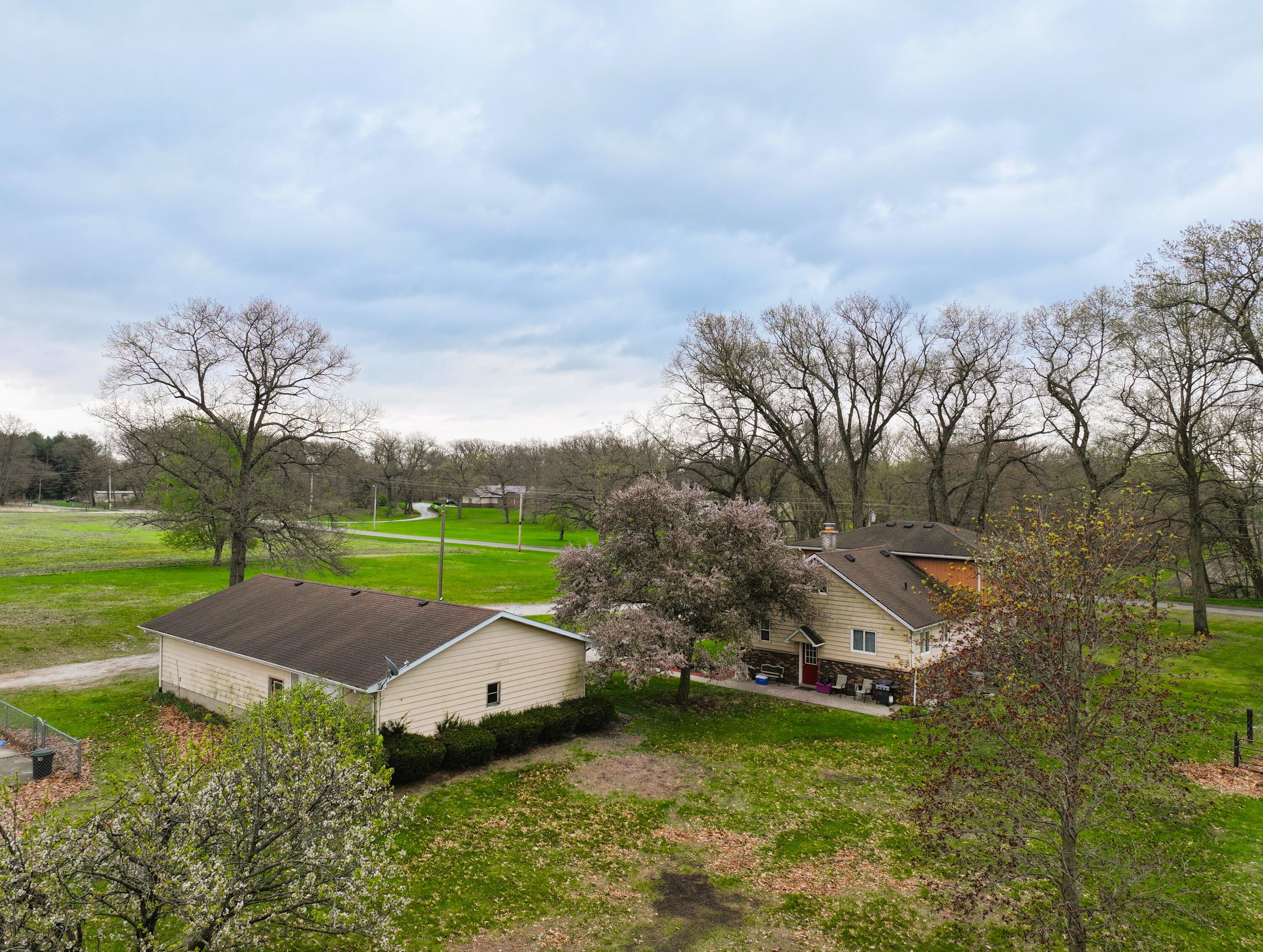 5110 West 400 North Winamac, IN 46996 - Photo 12 of 35 an aerial view of a house with garden space and street view
