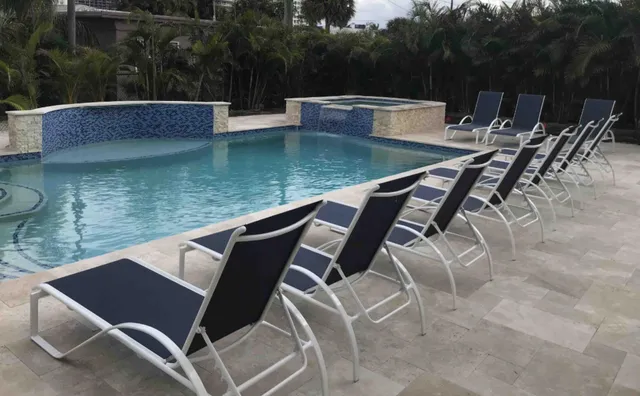 a view of a chairs and table on the terrace