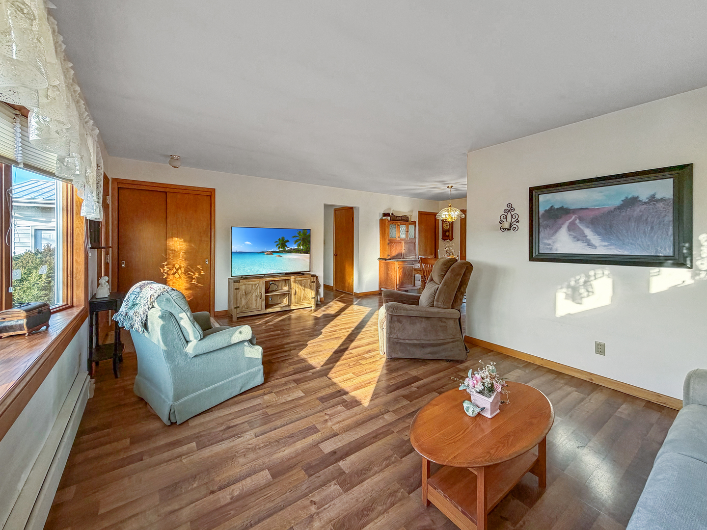 6057 North Lake Road Lena, IL 61048 - Photo 11 of 22 a living room with furniture and a table