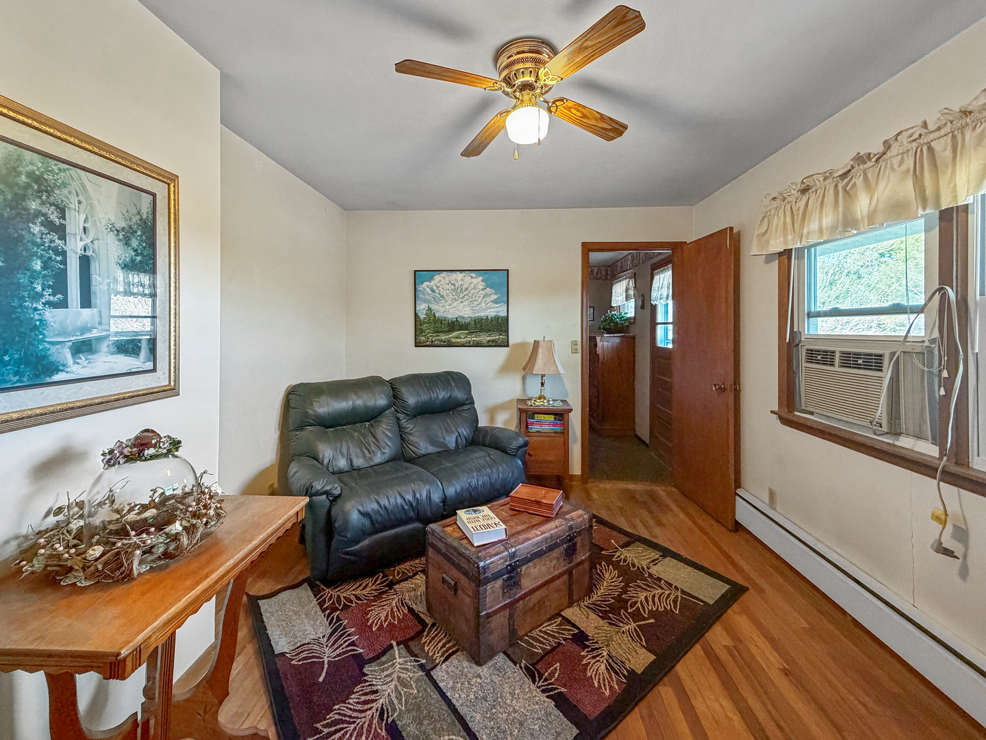 6057 North Lake Road Lena, IL 61048 - Photo 12 of 22 a living room with furniture and a window