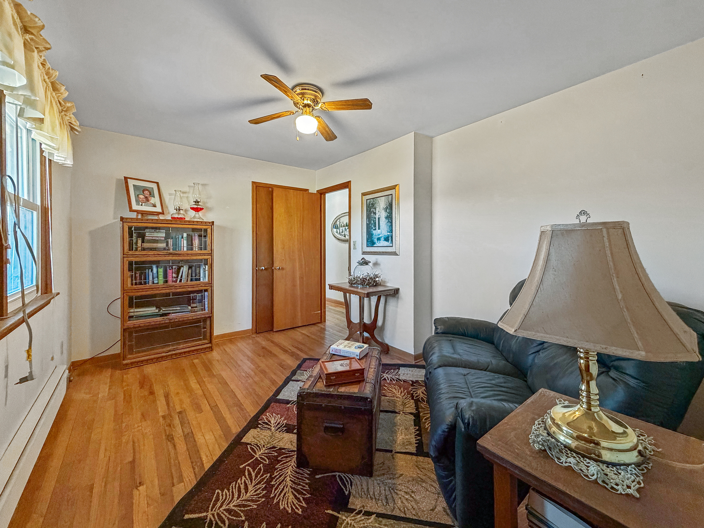 6057 North Lake Road Lena, IL 61048 - Photo 13 of 22 a living room with furniture and a flat screen tv