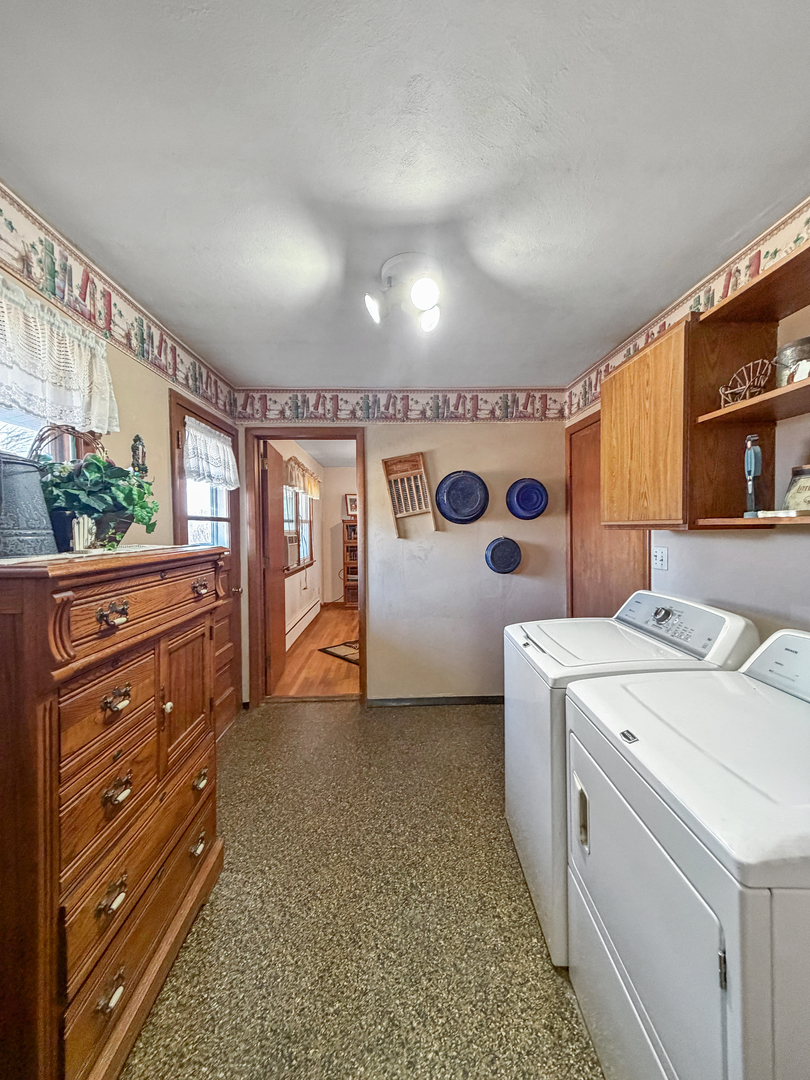 6057 North Lake Road Lena, IL 61048 - Photo 19 of 22 a view of utility room with washer and dryer
