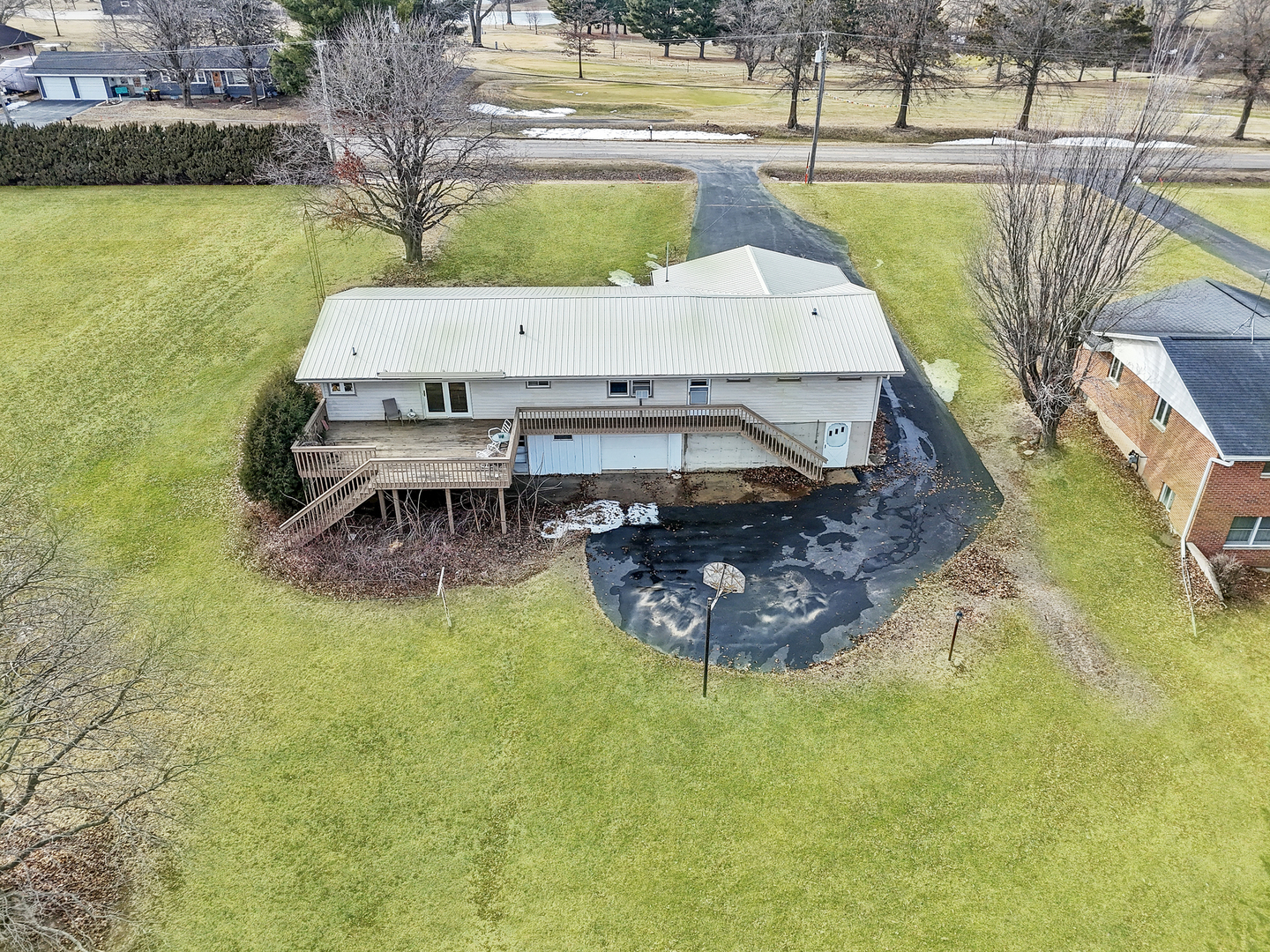 6057 North Lake Road Lena, IL 61048 - Photo 22 of 22 a swimming pool with outdoor seating and yard