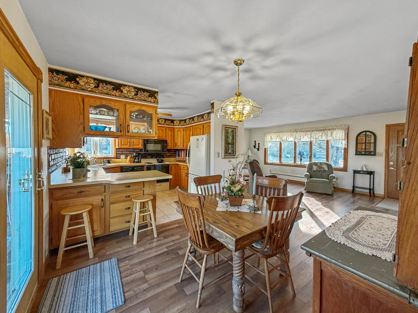 6057 North Lake Road Lena, IL 61048 - Photo 7 of 22 a view of a dining room with furniture