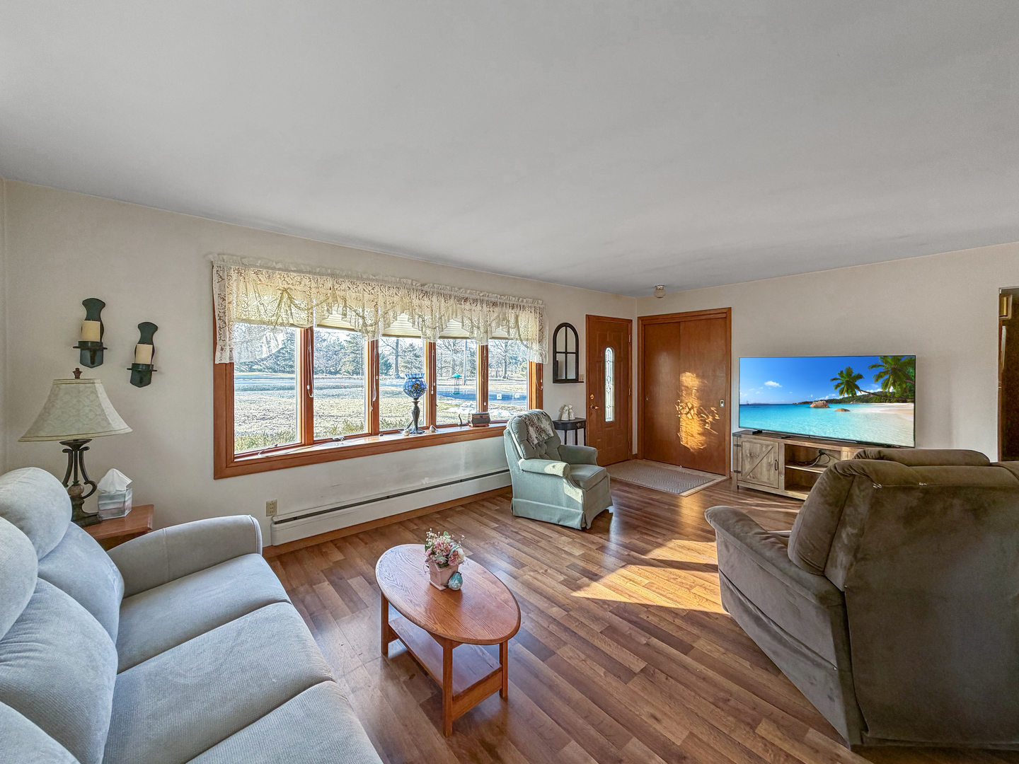 6057 North Lake Road Lena, IL 61048 - Photo 10 of 22 a living room with furniture and a large window