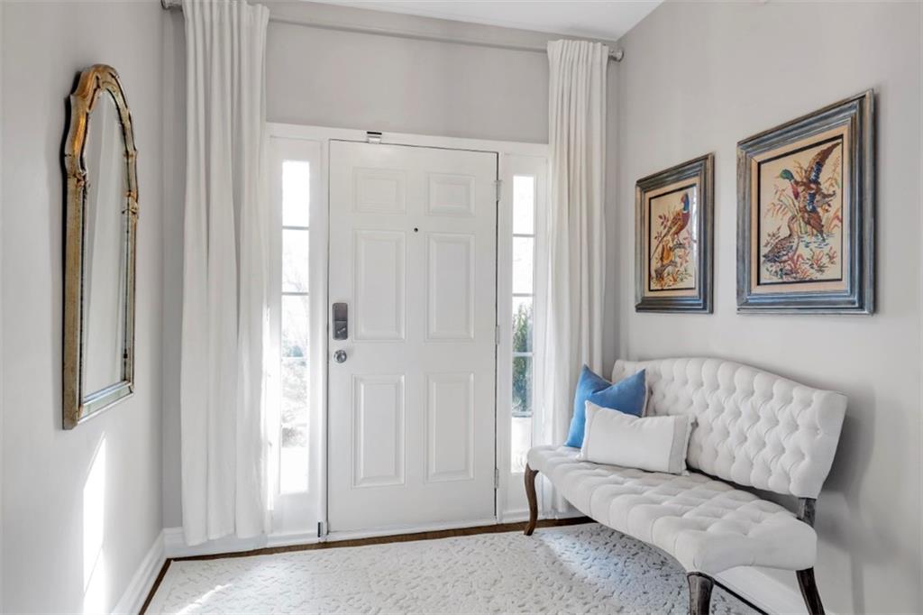 1075 Julius Drive Suwanee, GA 30024 - Photo 3 of 21 a living room with furniture and a painting