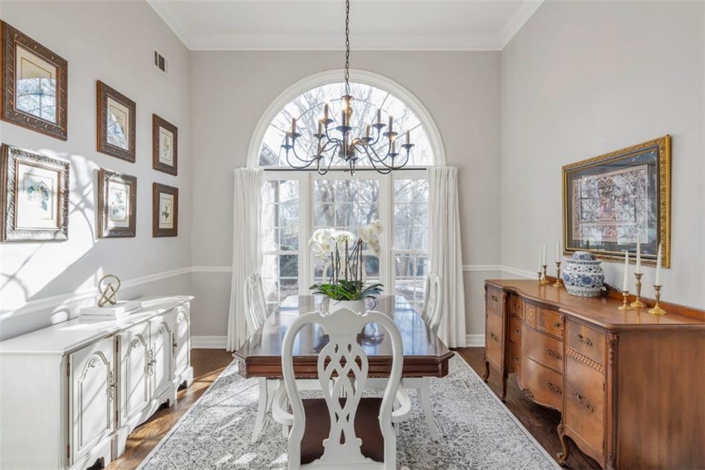 1075 Julius Drive Suwanee, GA 30024 - Photo 6 of 21 a view of a dining room with furniture window and outside view