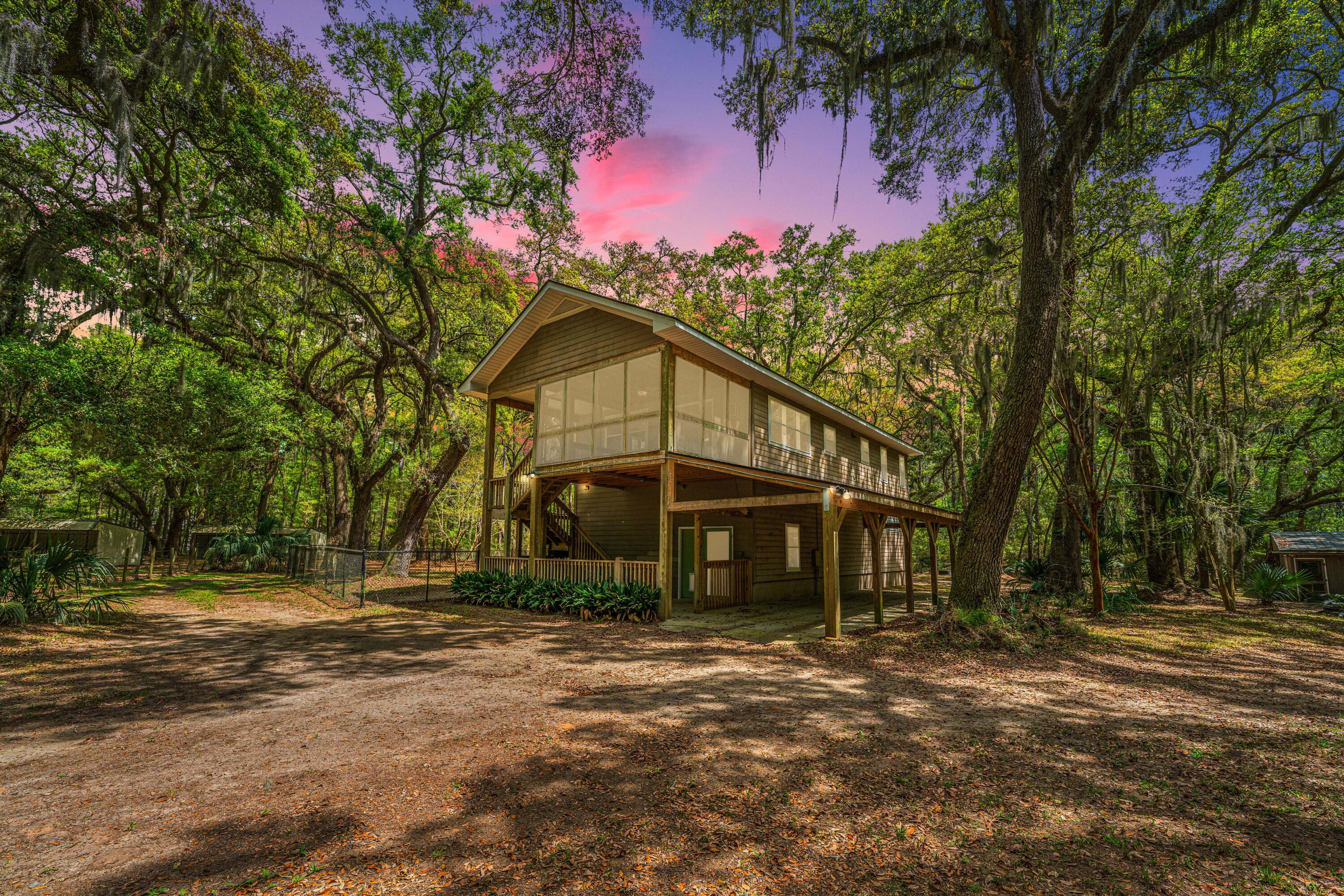 8389 Chisolm Plantation Road Edisto Island, SC 29438 - Photo 1 of 62 8389ChisolmPlantationRd001