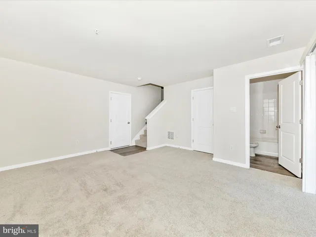 an empty room with a natural light