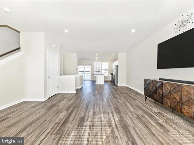a view of a living room hardwood floor