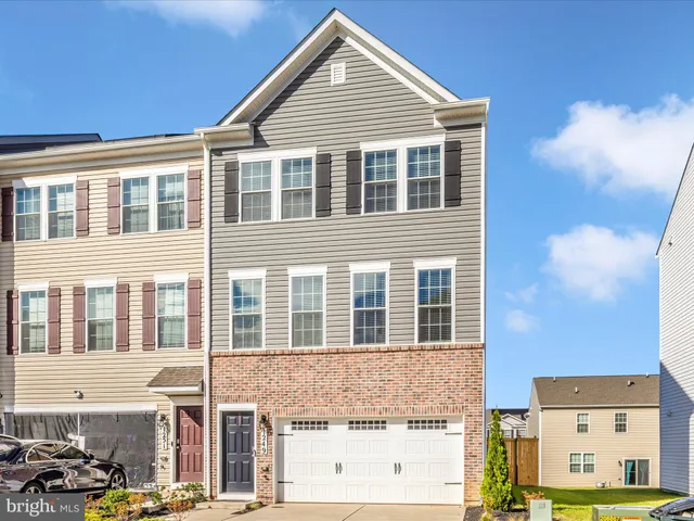 a front view of a building with glass windows
