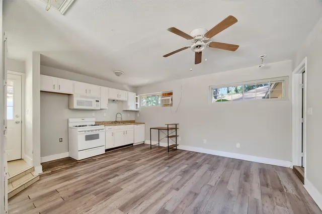 a room with microwave and stove