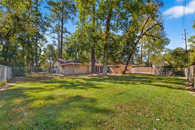 a view of a back yard of the house