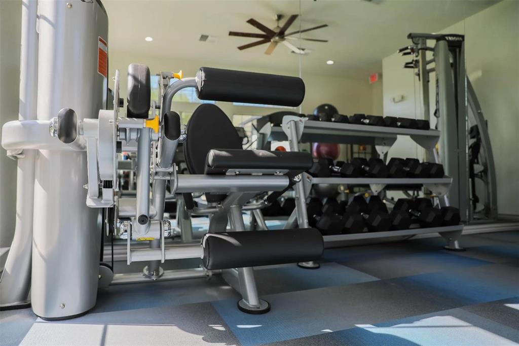 1600 North 9th Street, Unit A1R Midlothian, TX 76065 - Photo 14 of 40 a room with lots of wooden furniture