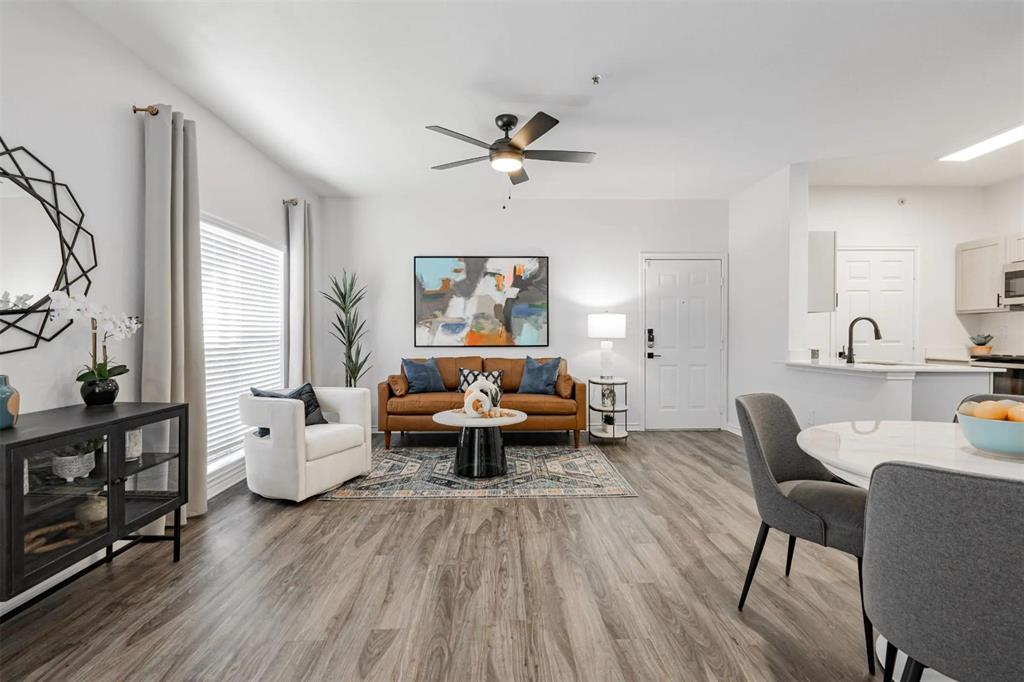 1600 North 9th Street, Unit A1R Midlothian, TX 76065 - Photo 21 of 40 a living room with furniture and wooden floor