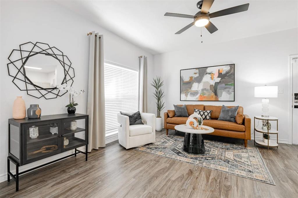 1600 North 9th Street, Unit A1R Midlothian, TX 76065 - Photo 22 of 40 a living room with furniture and a wooden floor