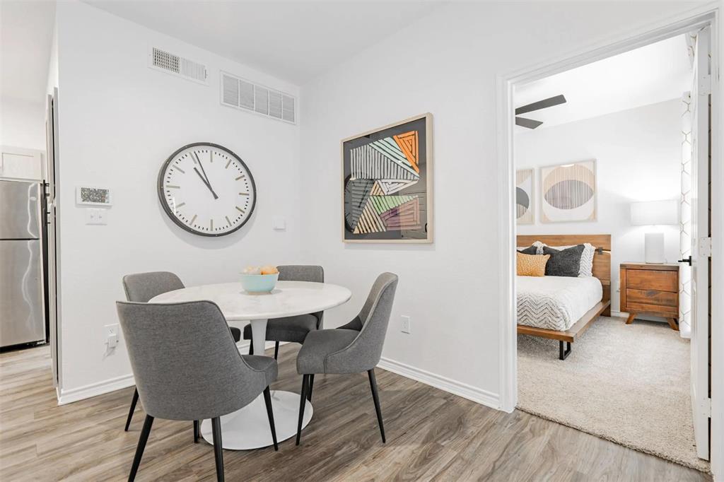 1600 North 9th Street, Unit A1R Midlothian, TX 76065 - Photo 31 of 40 a view of a dining room with furniture and a table